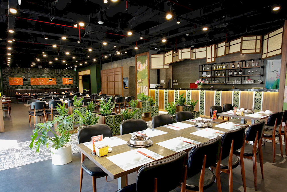 A warm space where the rich aroma of turmeric fish fills the air, perfect for enjoying authentic cha ca in comfort